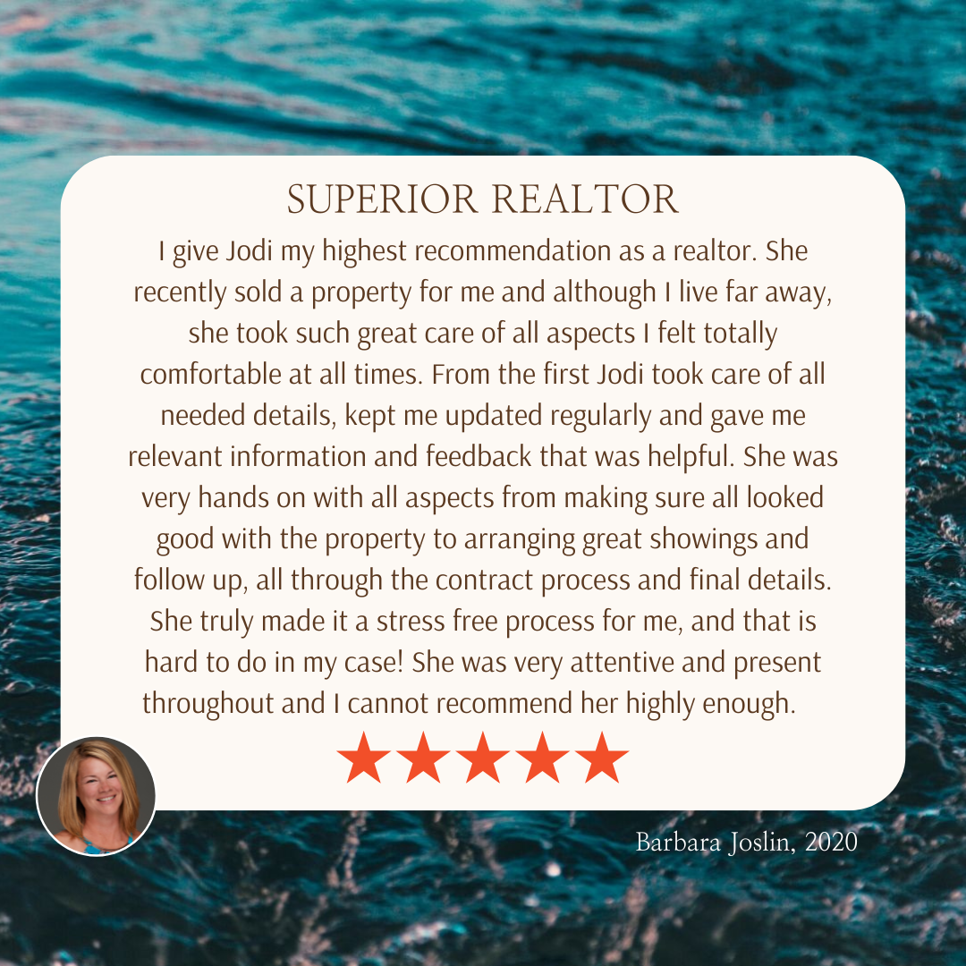 Review of Jodi's services from a previous client. The review is centred with a cream background and beach image behind that.