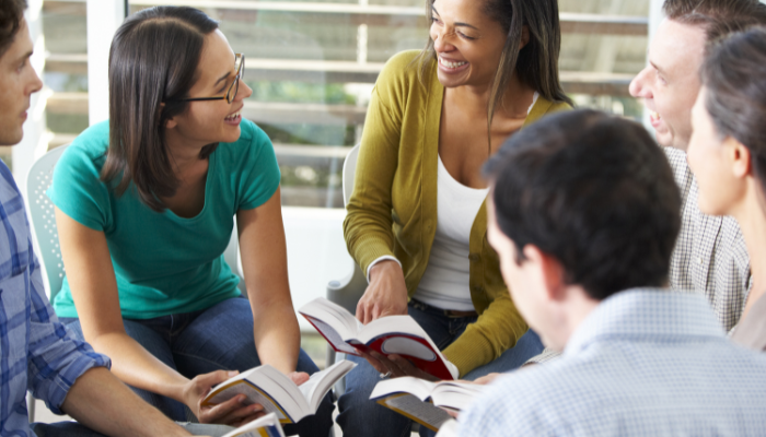group of people reading together