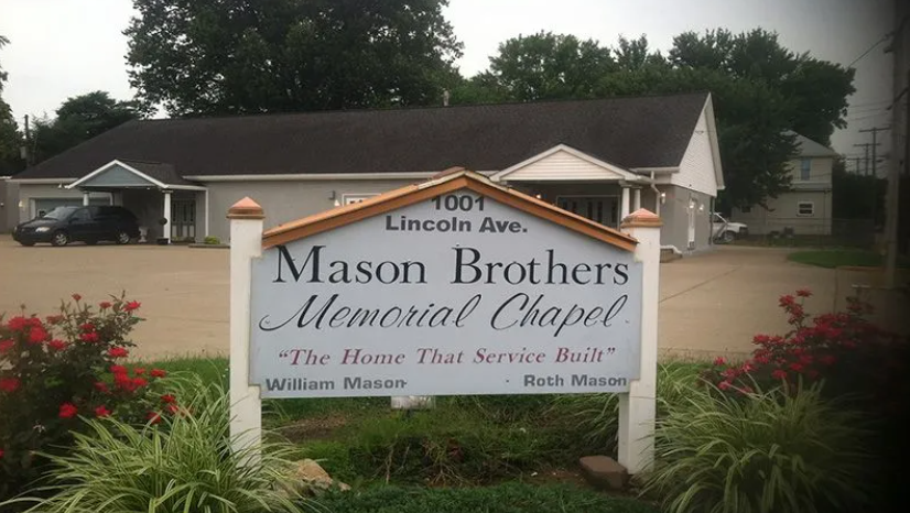 Mason Brothers Memorial Chapel sign in front of a building with trees and landscaping