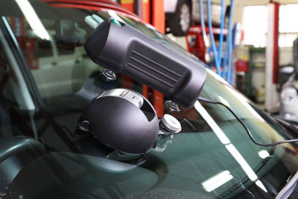 An Equipment Mounted on The Windshield of A Car — Lismore Car Repairs in Lismore, NSW
