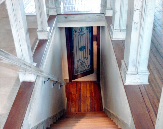 A set of stairs leading up to a door
