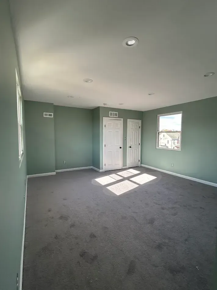 Finished green bedroom interior painting project in Montgomery County PA