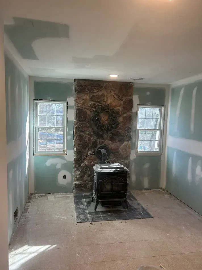 Greenboard drywall installed on basement walls during a moisture-resistant drywall project in Montgomery County, PA.