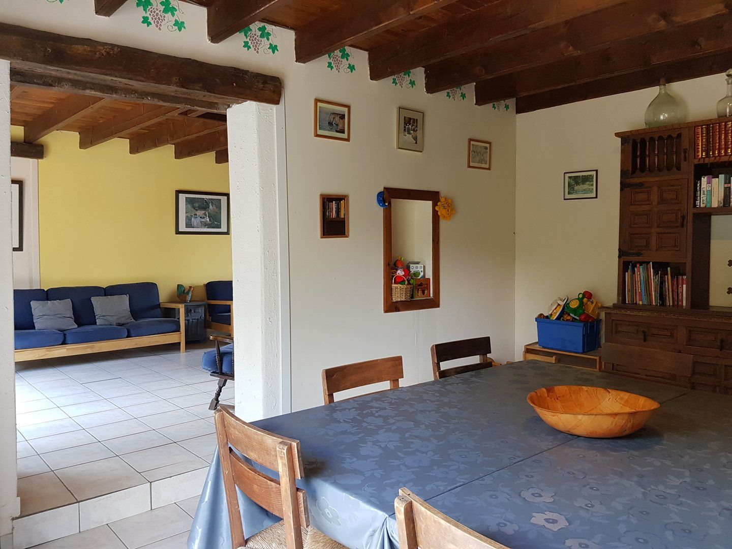 dining room with square table and grey tablecloth