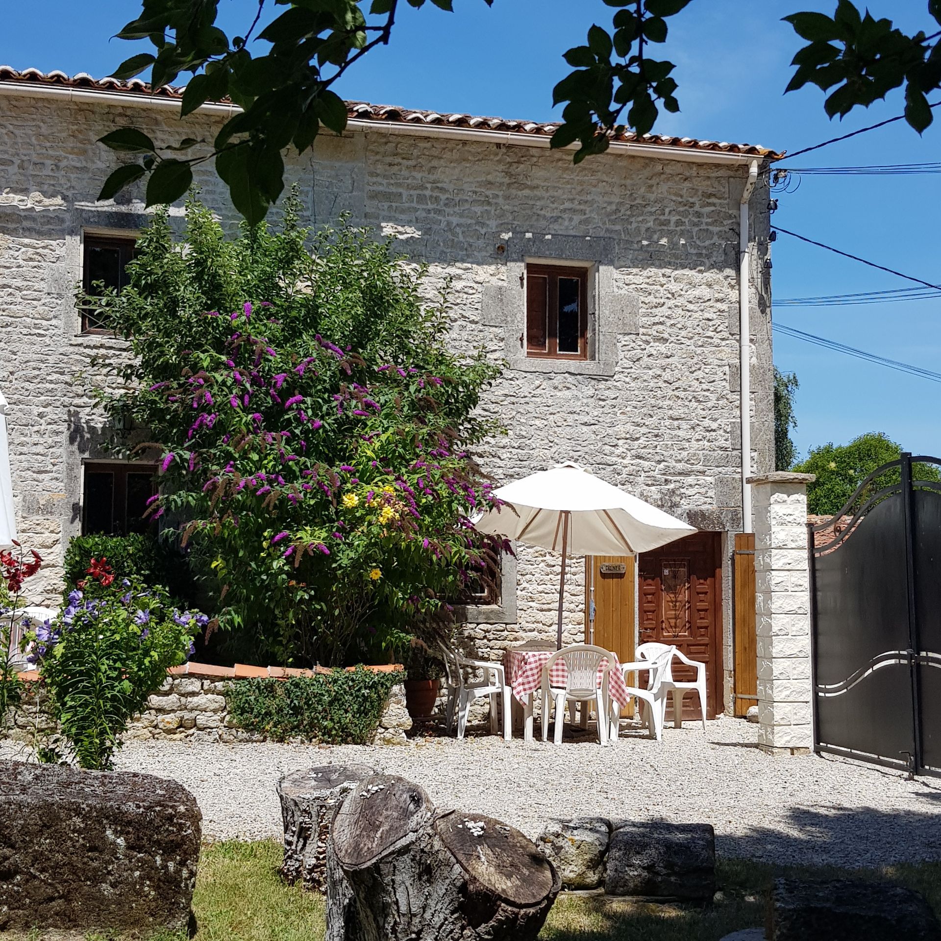stone cottage with garden table
