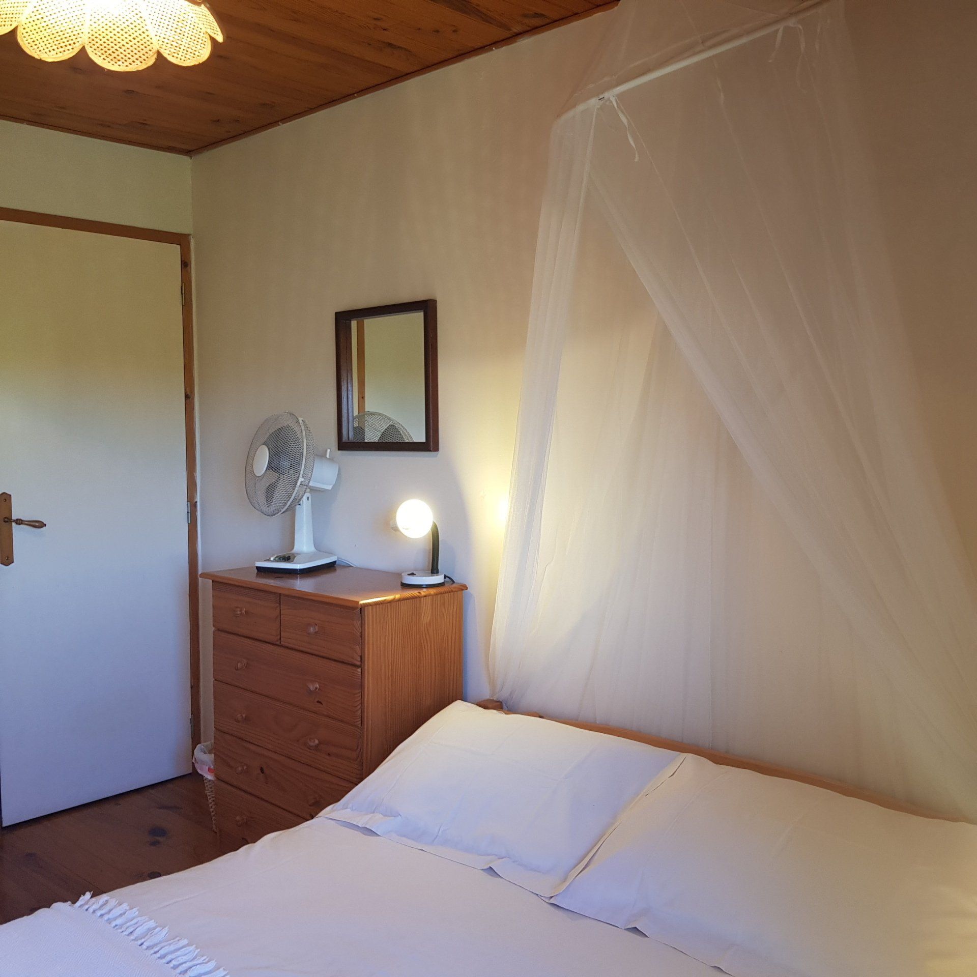 double bed with white bedding