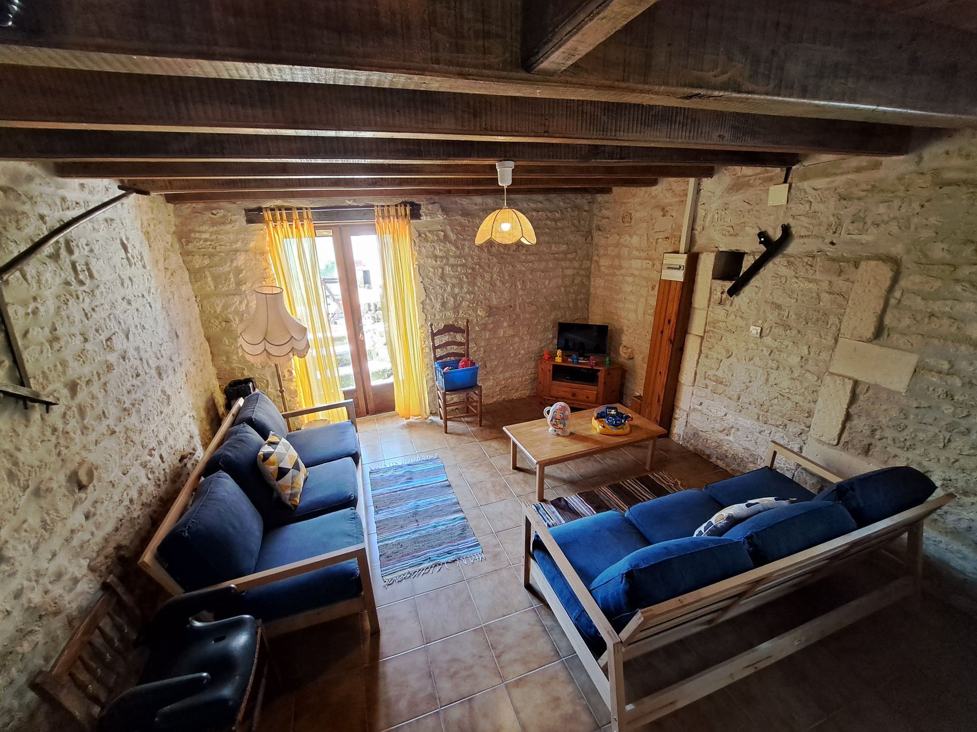 sitting room with blue ikea sofas