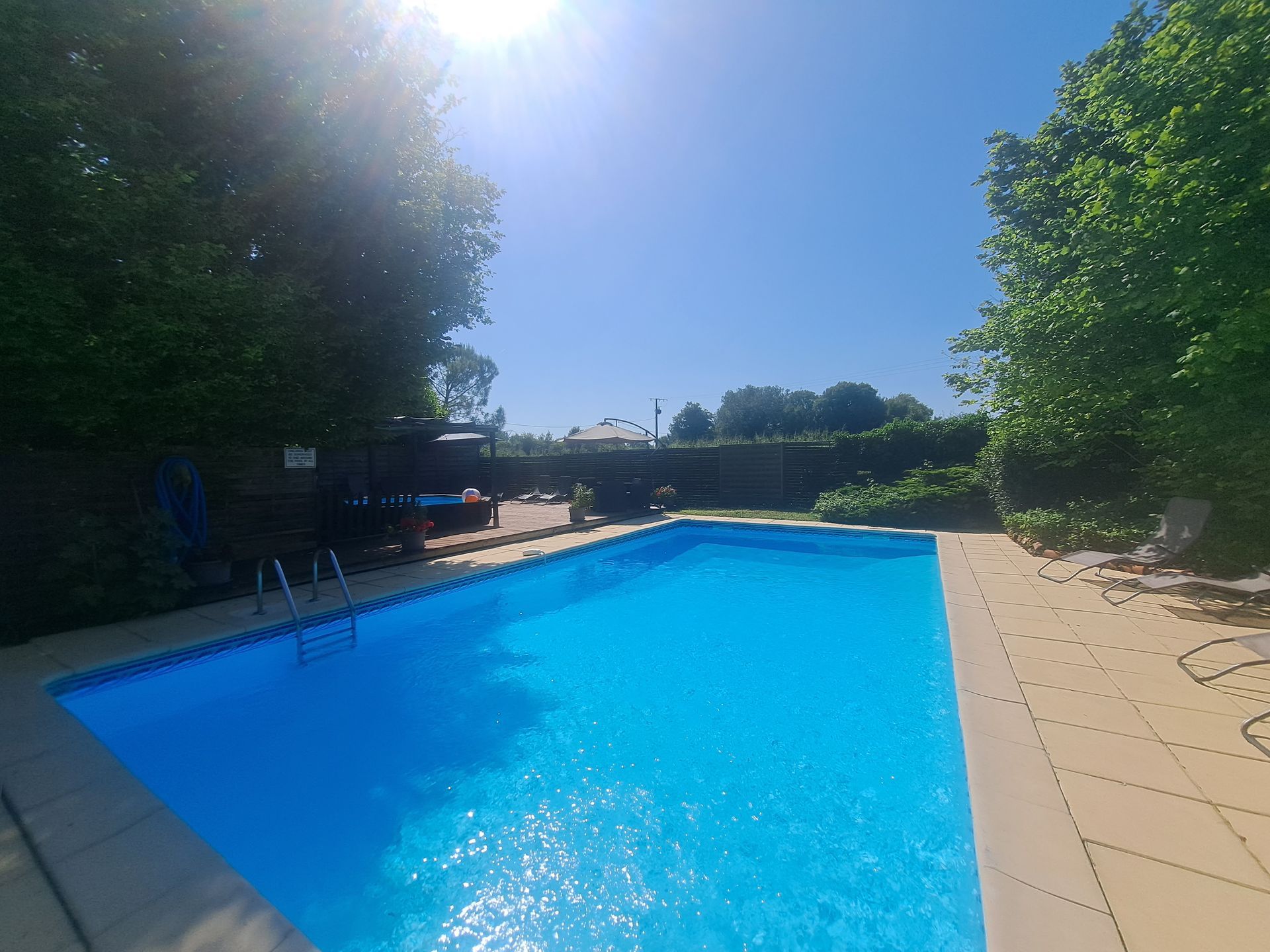 a swimming pool in the sunshine