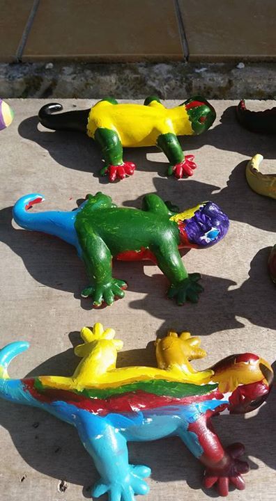 colourfully painted pottery lizard