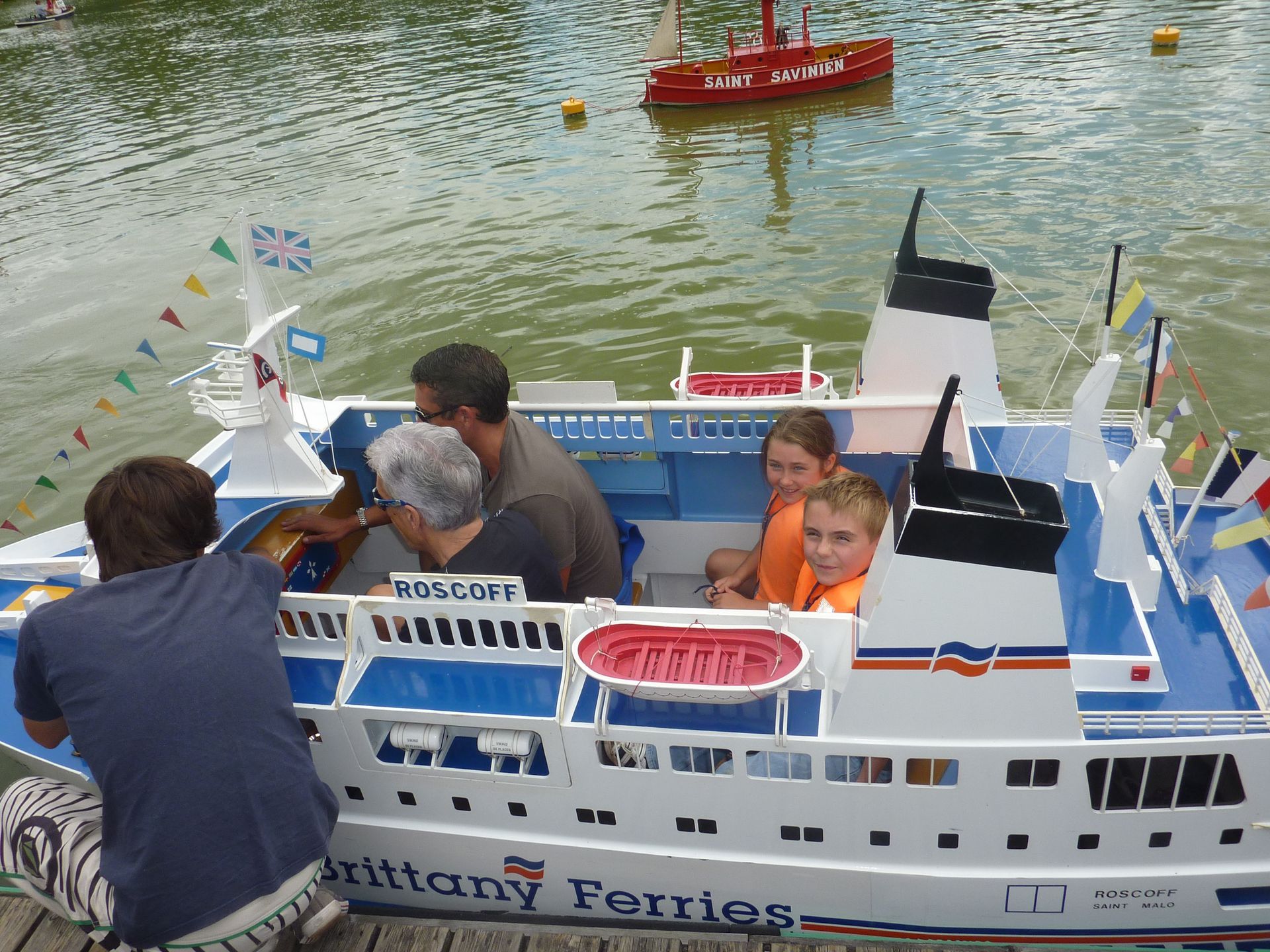 miniature ferry on a lake