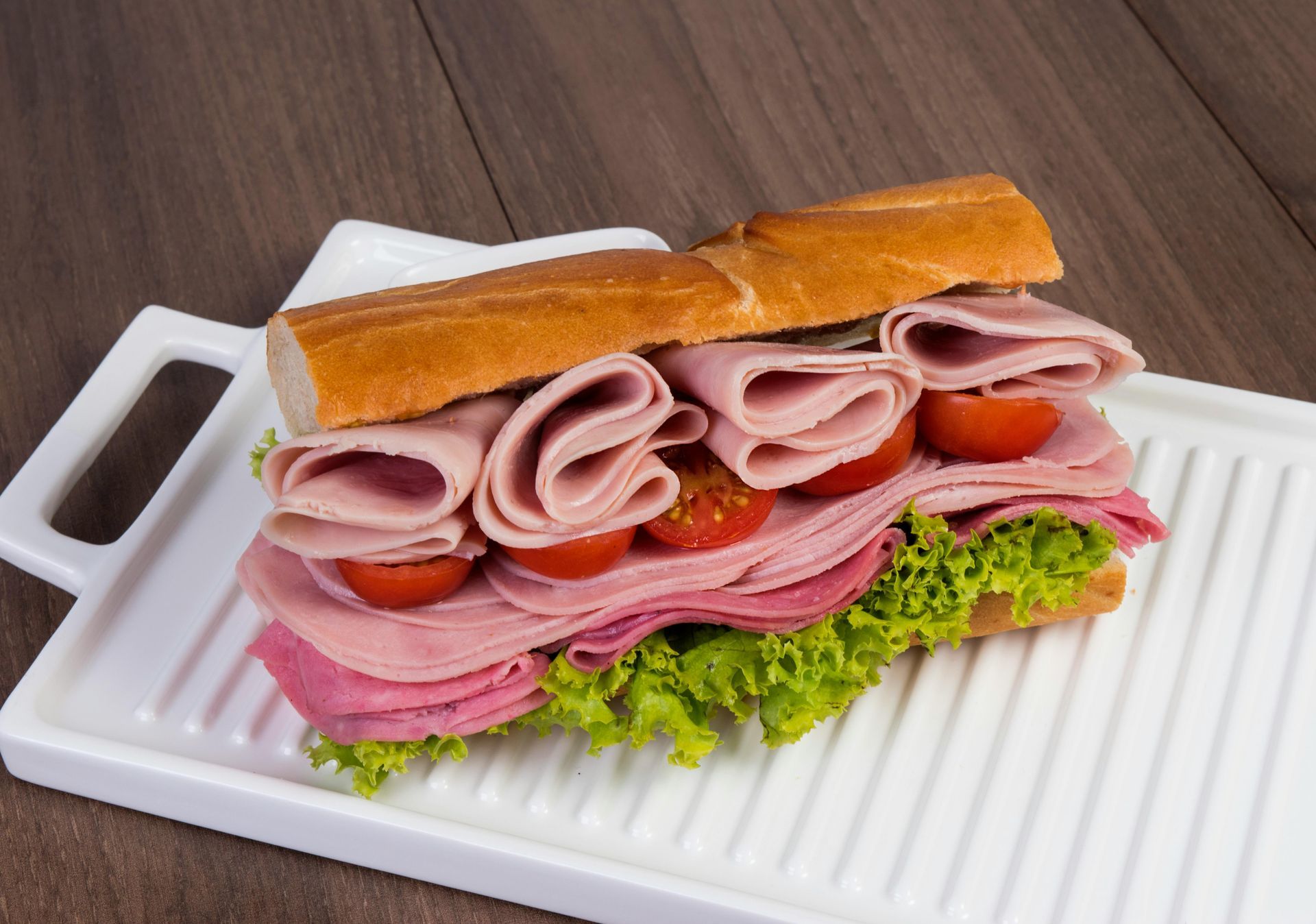 a ham salad sandwich in baguette bread