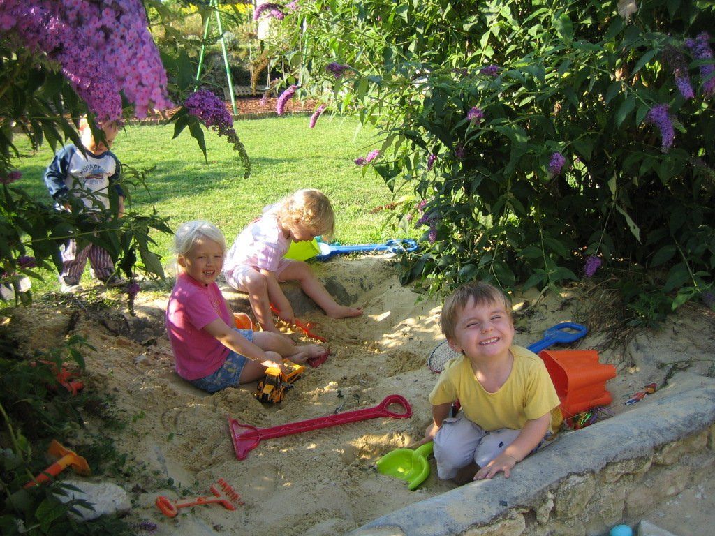 children playing in a sandpit