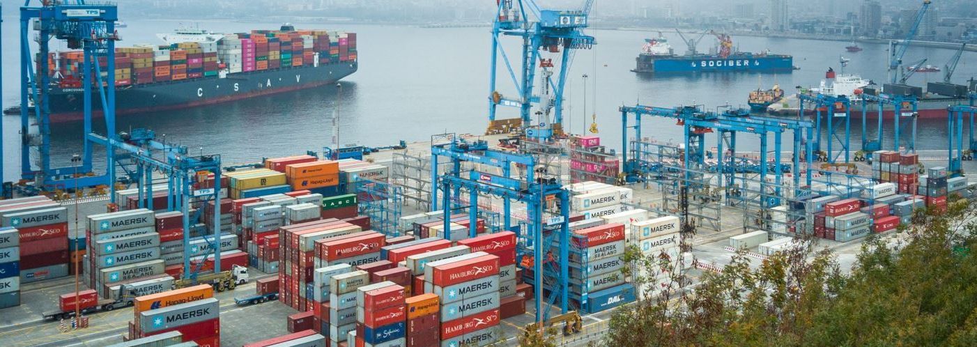 Port with Container Ships Representing the Supply Chain Issues Caused by the Covid-19 Pandemic
