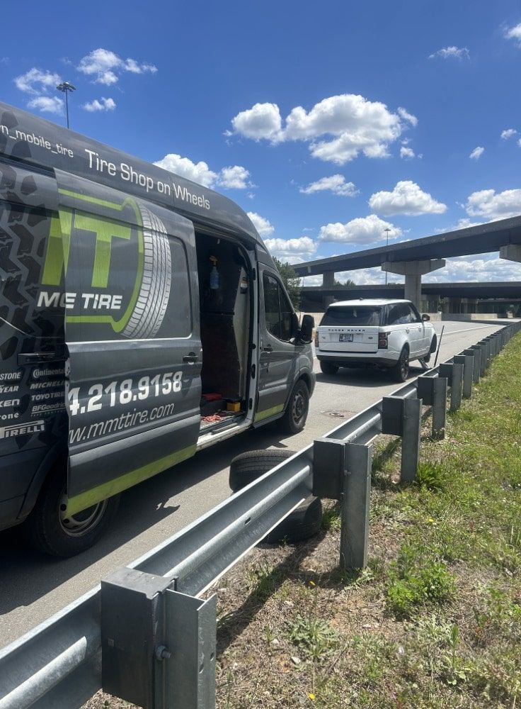 MMT Van on Side of Road with SUV
