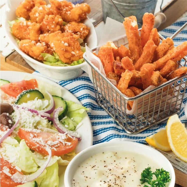 photo of fish and chips with a greek salad