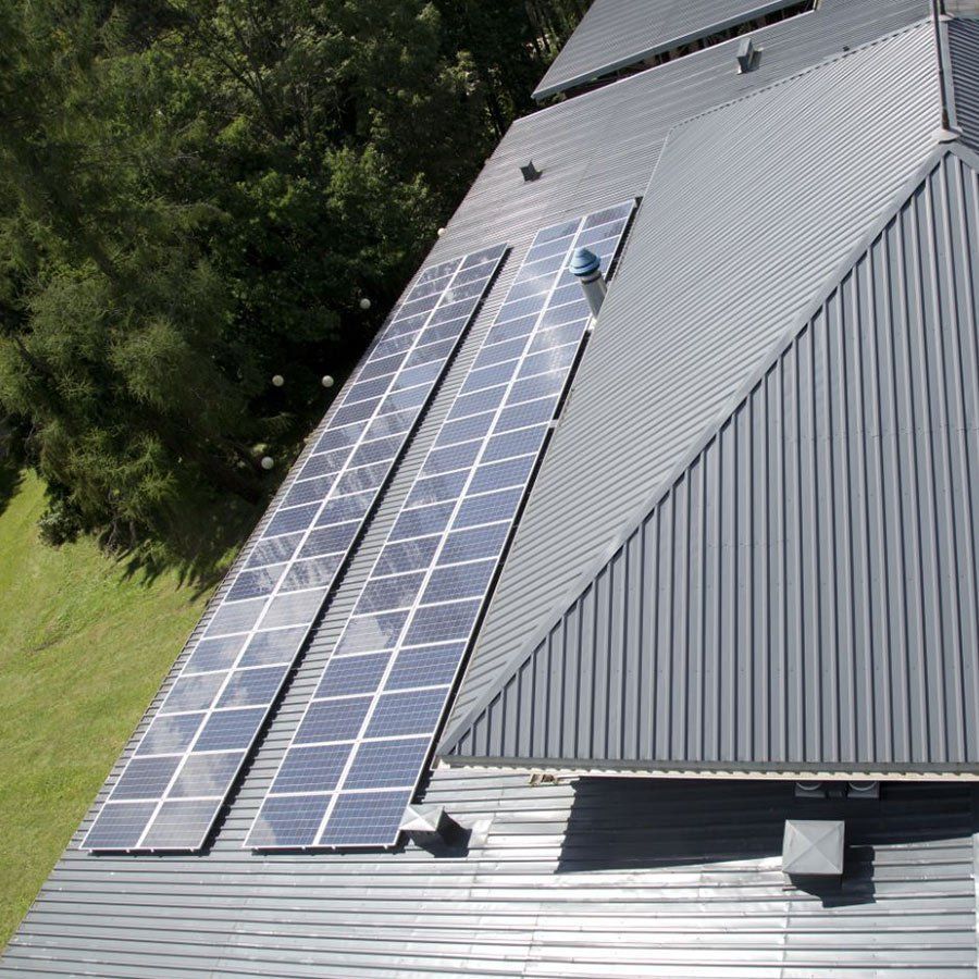 Roof With a Lot of Solar Panels on It — CP Roofing in Old Bar, NSW