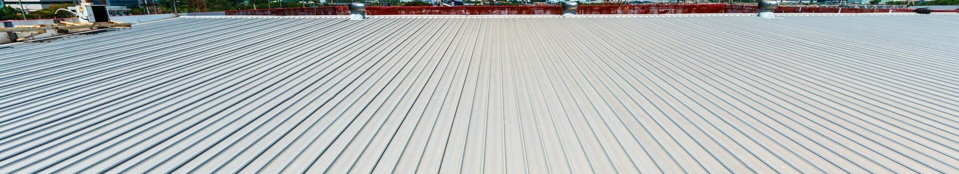 Blurred Image of a White Tiled Floor in a Park — CP Roofing in Harrington, NSW