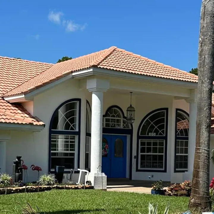 Best Soft Wash Roof Cleaning in Ormond Beach! A luxury house in Ormond Beach with an professional roof wash on its terracotta tiled roof.