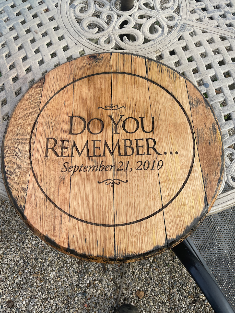 A wooden barrel with the words do you remember written on it