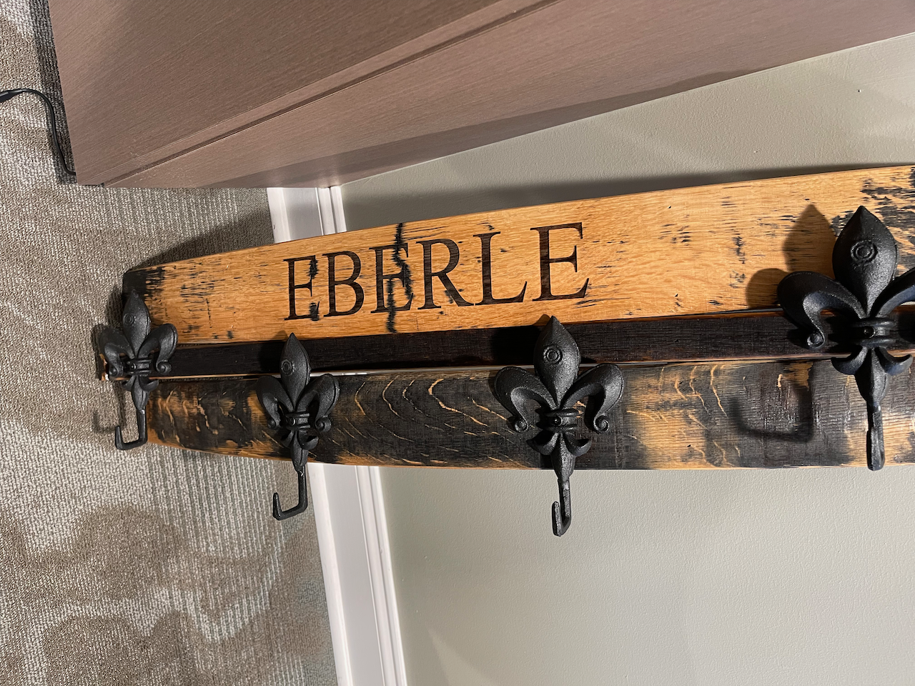 A wooden sign with the word eberle on it
