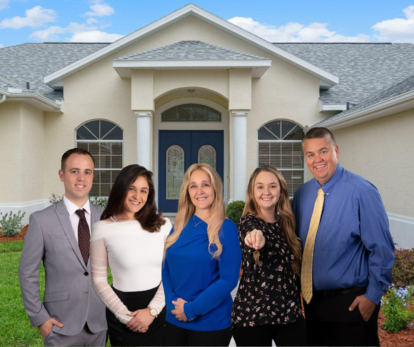 Team photograph of The Bradley Team Keller Williams Realty Realtors.