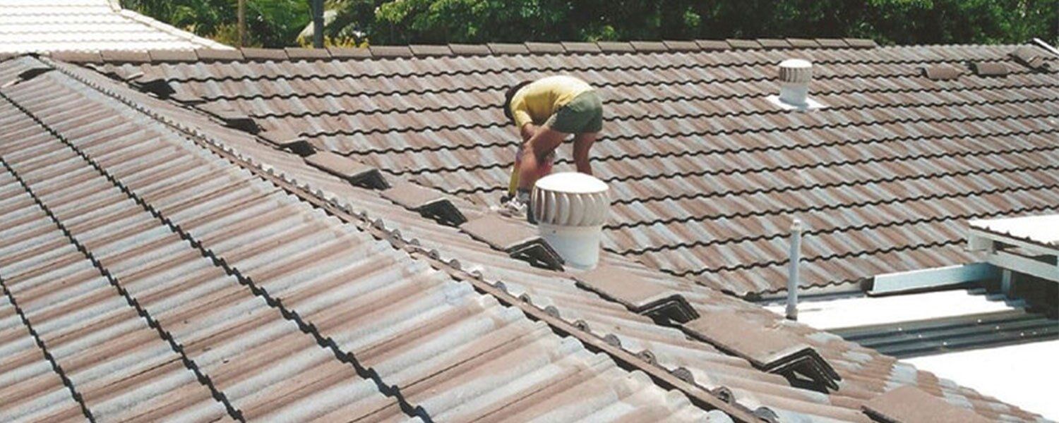 Man Installing Roof — Ninja Roofing Pty Ltd in Central, QLD