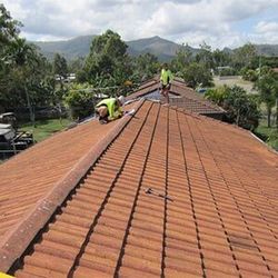 Men fixing Tail Roof — Ninja Roofing Pty Ltd in Central, QLD Men fixing Tail Roof — Ninja Roofing Pty Ltd in Central, QLD