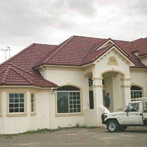 House with Roof Tiles  — Ninja Roofing Pty Ltd in Central, QLD