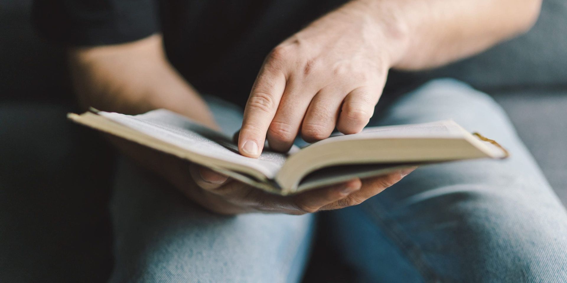 Stock image of a man reading a bible