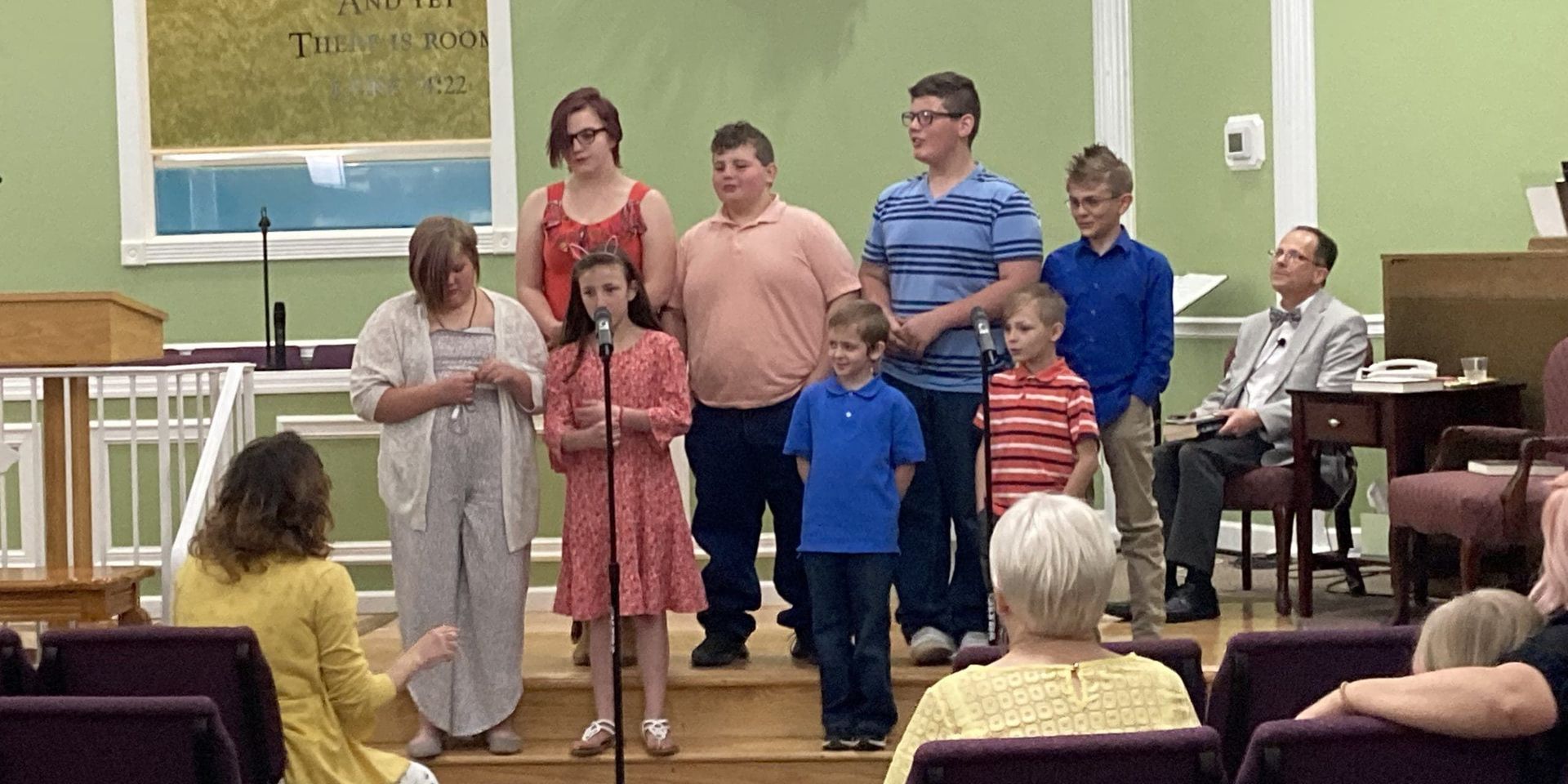 Young people singing a special