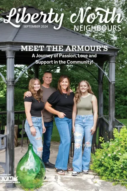 Three women standing outside a gazebo under “Meet the Armourers” magazine cover text