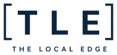 TLE logo in navy blue with bracketed letters and the words “THE LOCALE EDGE” underneath
