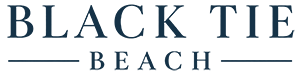 Gold circular logo on black background. Text reads "Black Tie Beach, luxury decor & gifts" with a bow tie icon.