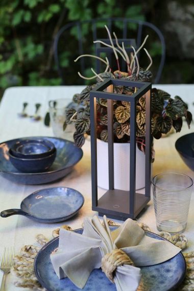 Outdoor table setting styled with Black Tie Beach decor