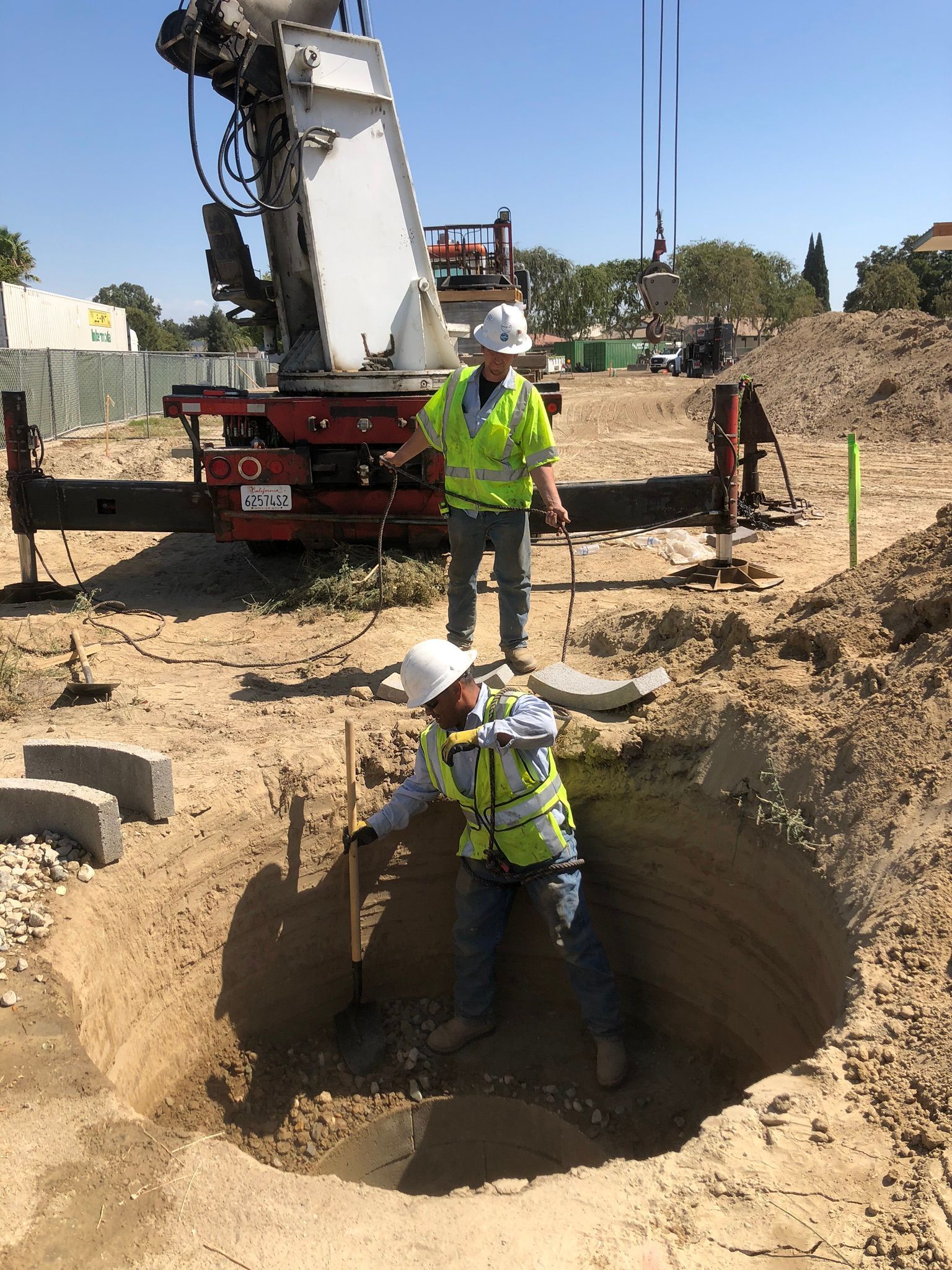 Installing a High-Capacity Commercial Stormwater System Vertical Bucket Rig drilling large-diameter stormwater area drain in Lemoore, CA (Kings County) — Big Bore Drilling Inc.