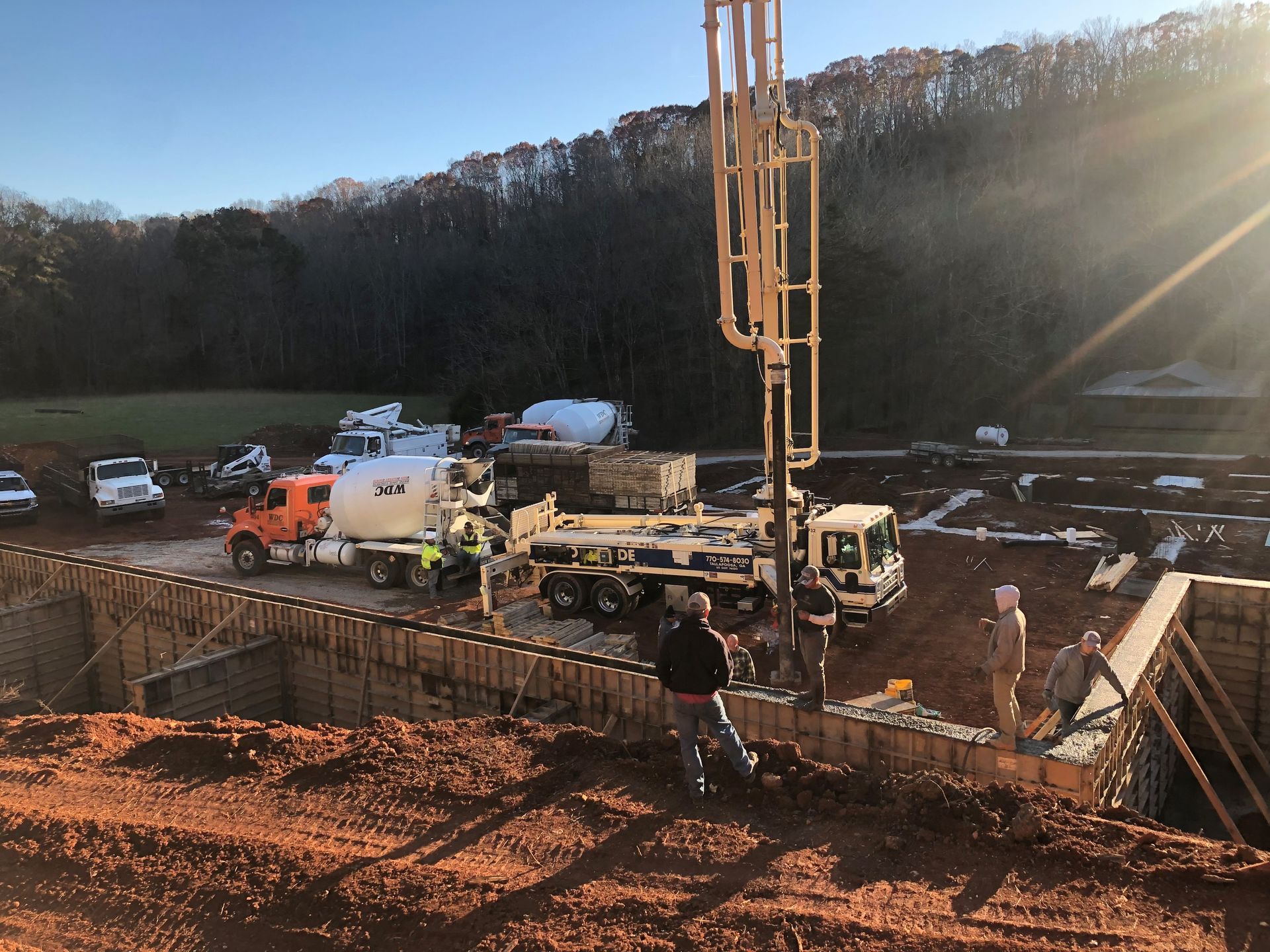 A Group of Construction Workers Are Working on a Construction Site | Tallapoosa, GA | Taylor-Made Pumping