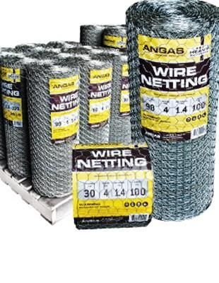 A Bunch of Rolls of Wire Netting Sitting on Top of A Wooden Pallet — Hazells Farm & Fertilizer Services in Taminda, NSW