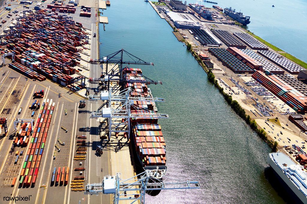 An aerial view of a large ship in a harbor