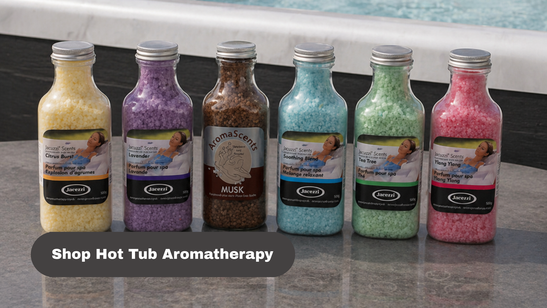 Six colorful bath bottles lined up on a counter with “Shop Hot Tub Aromatherapy” text.