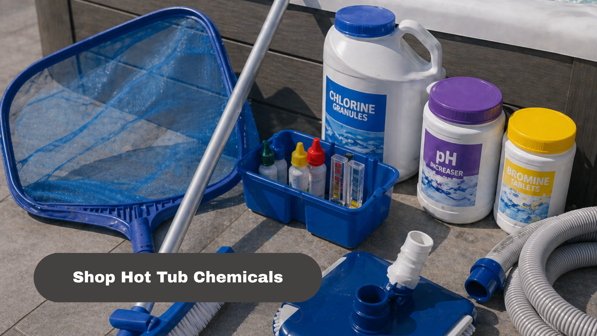 Hot tub chemicals and cleaning tools, including bottles, a net, and a hose on a pool deck.
