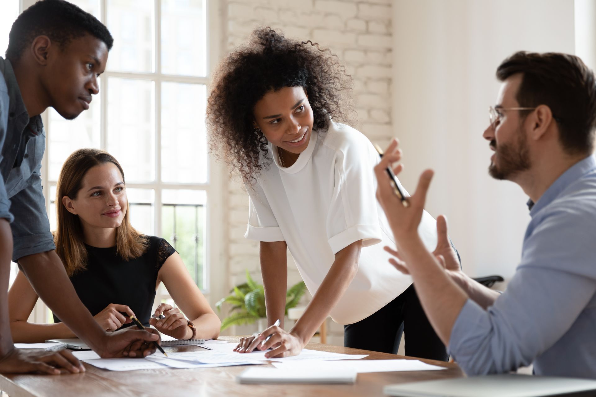 The team works through conversation and debate to form the best employee benefits strategy