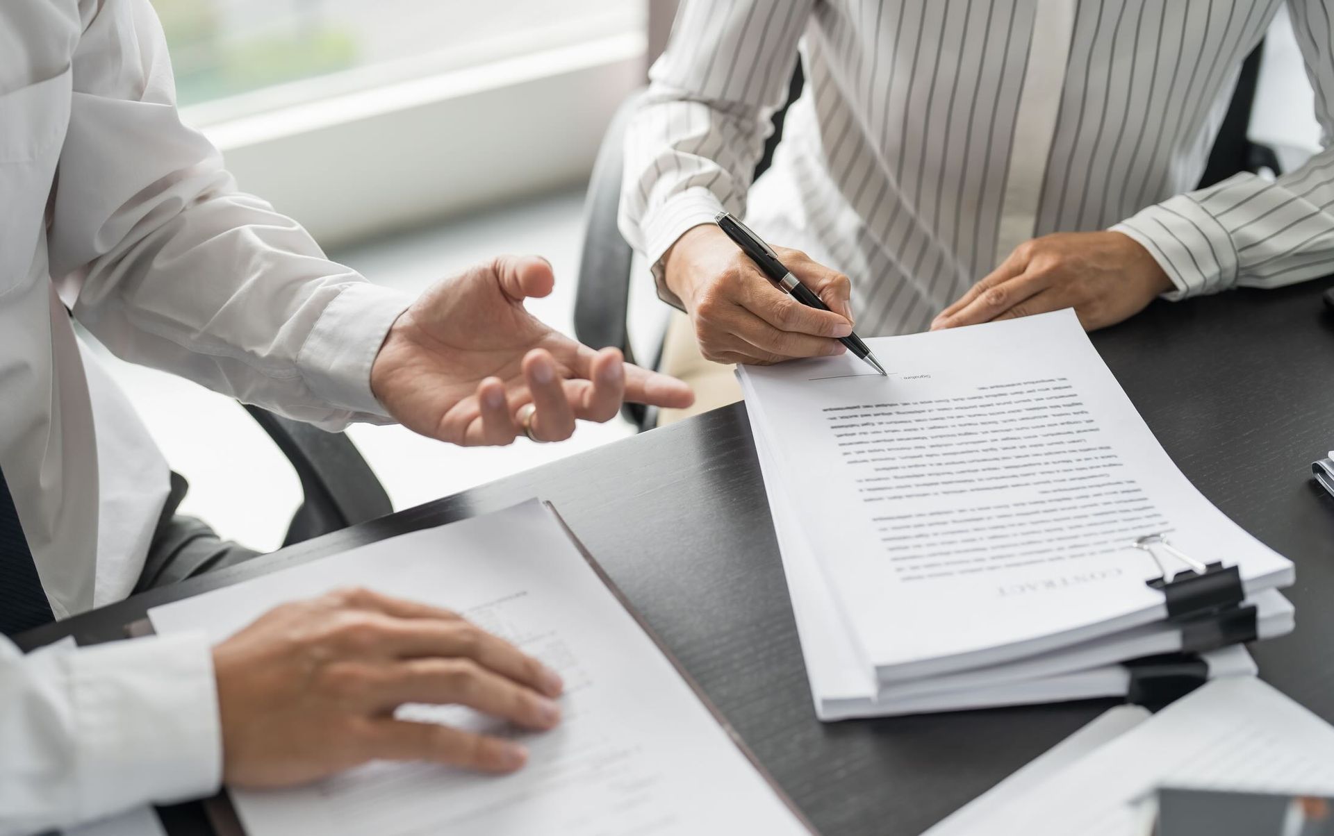 Sales manager giving advice application form document, considering mortgage loan offer for car and house insurance. Real estate investment Property insurance and security.