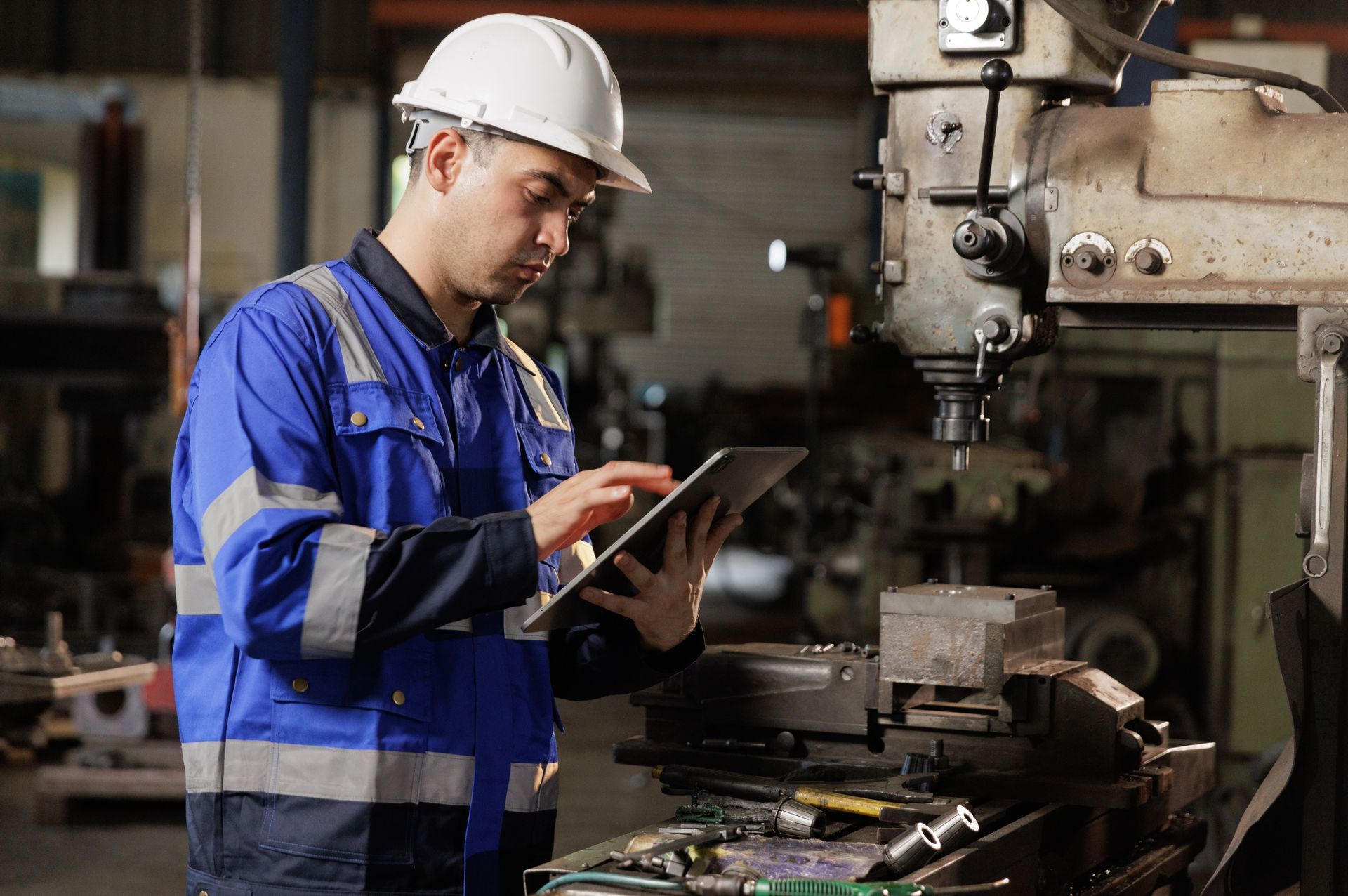 manufacturing technician, whose employer is protected with manufacturing insurance