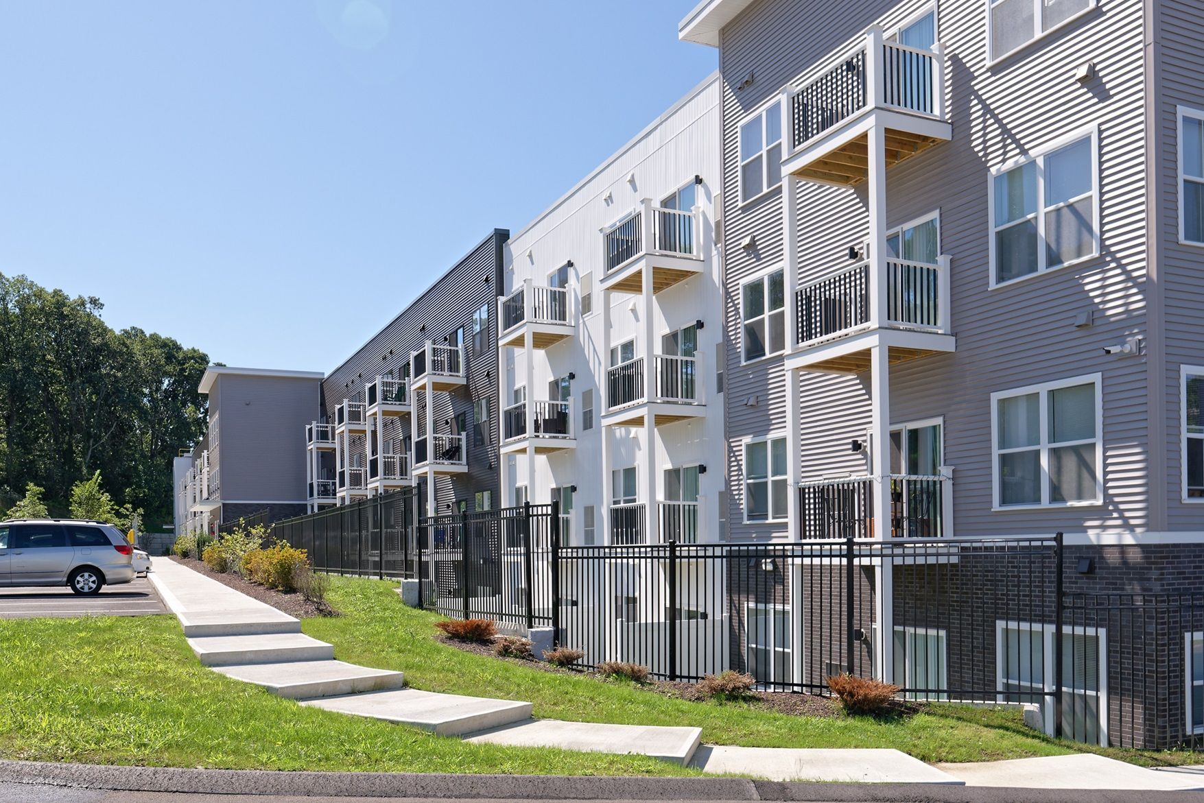 A private balcony at a Kiln apartment overlooking the Greendale neighborhood in Worcester
