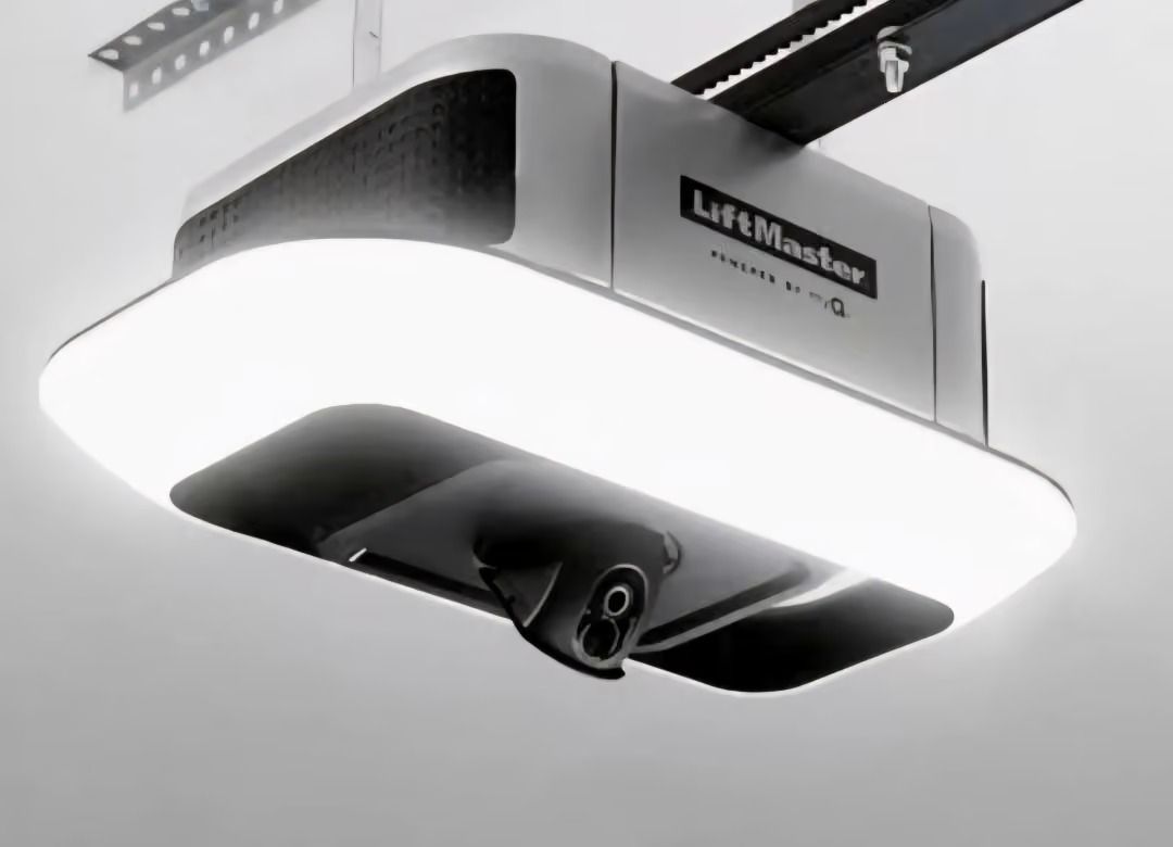 Ceiling-mounted garage door opener with bright LED light and camera underneath