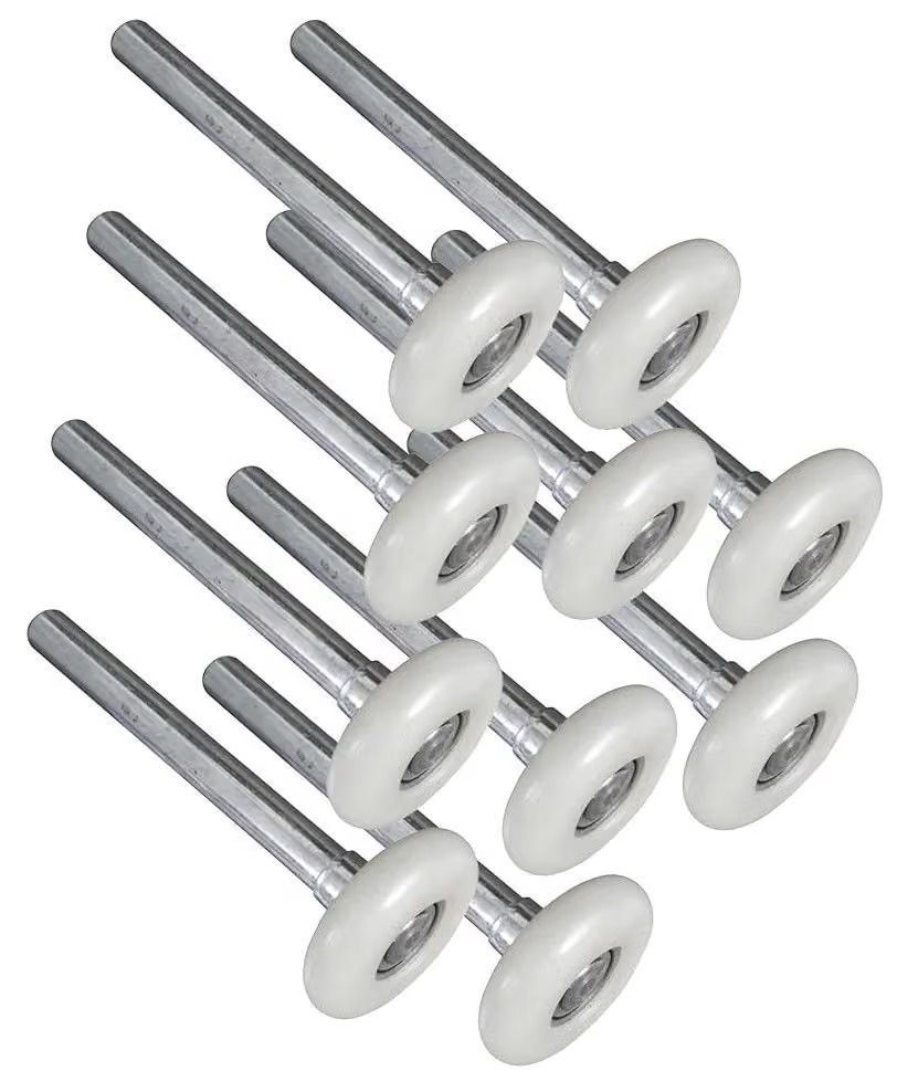 White plastic wall hooks with metal pins arranged in a cluster on a white background