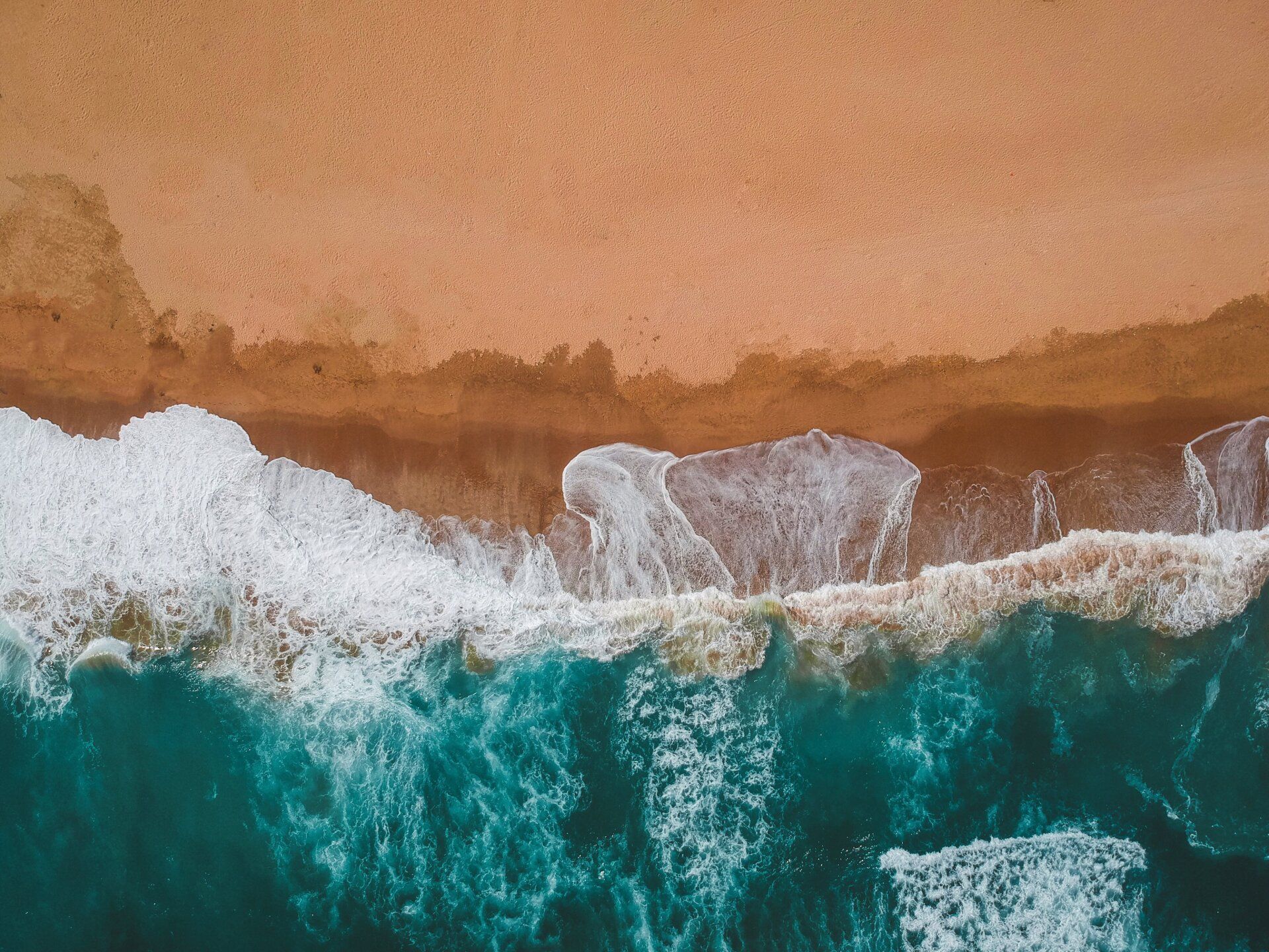 Aerial photo of waves on a beach