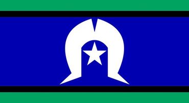 A blue and green flag with a white horseshoe and a star on it.