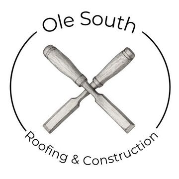 Two roofers installing shingles on a roof; one working, the other placing shingles, gray shingles on the lower half, unfinished top.