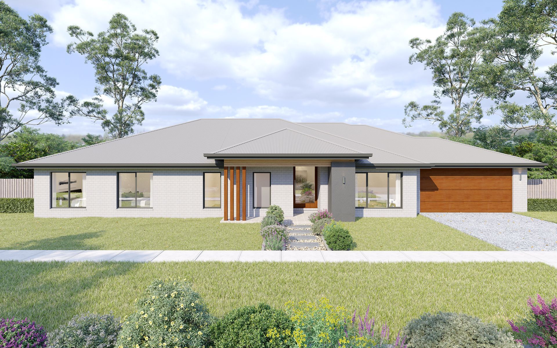 Modern single-story house with grey roof, white walls, and a wooden garage in a green landscaped setting — Twomey Homes in Delacombe, VIC